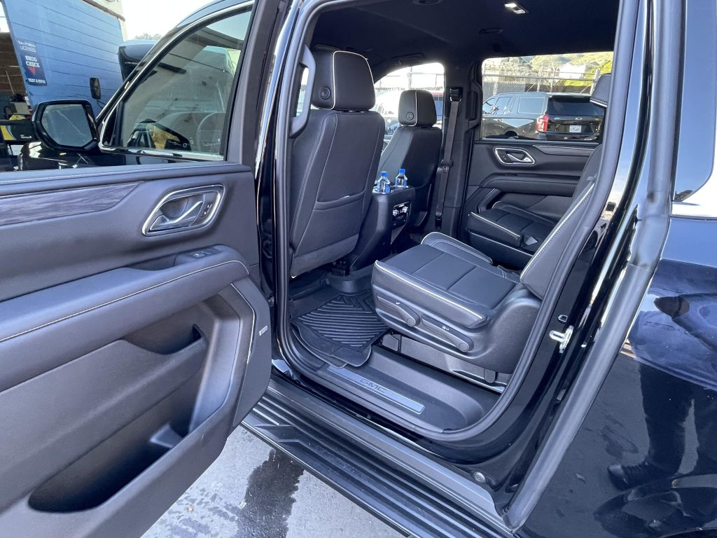 Side-view of a GMC Yukon with an open door