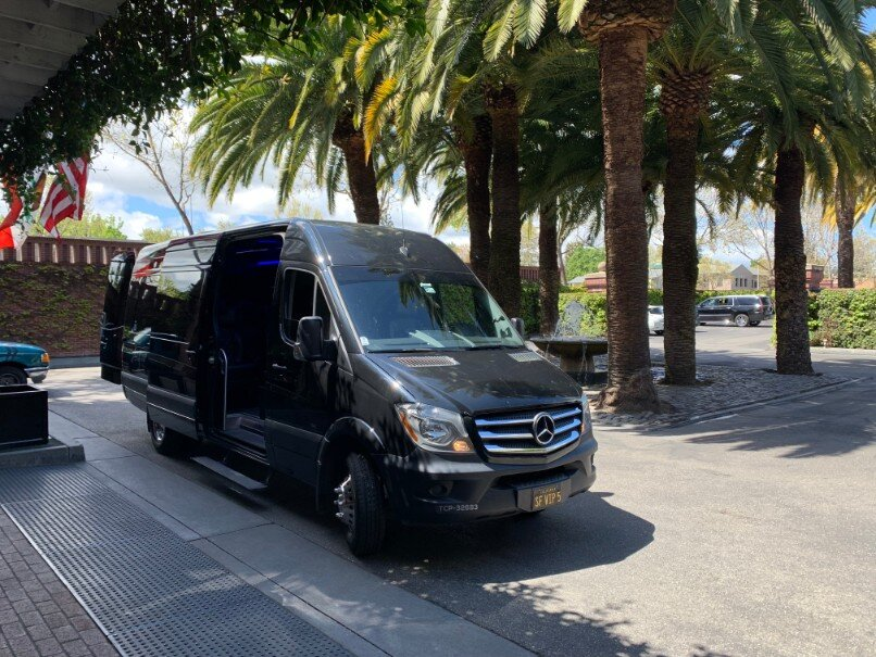 A Mercedes Sprinter van with an open door
