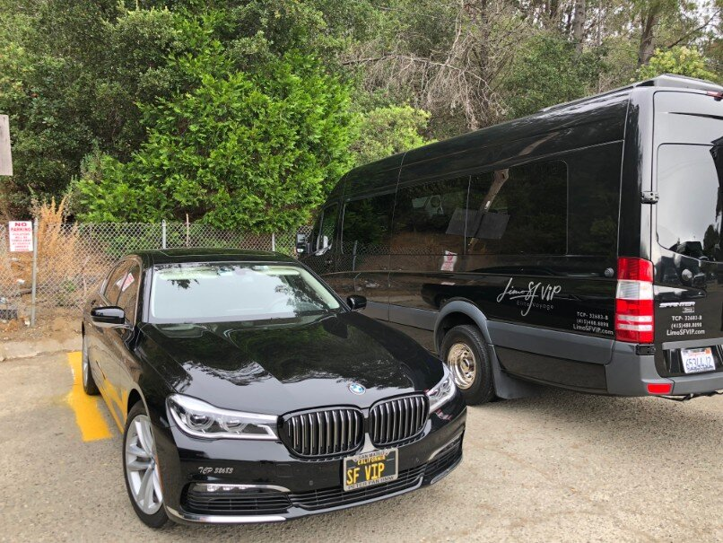 A BMW 750i in a parking area