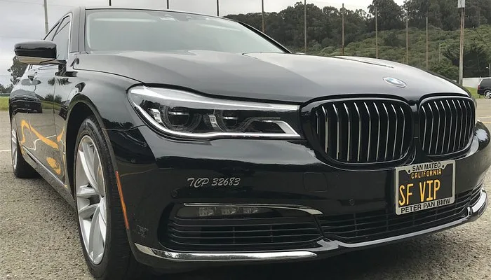 Black BMW 7 Series sedan with an SF VIP license plate