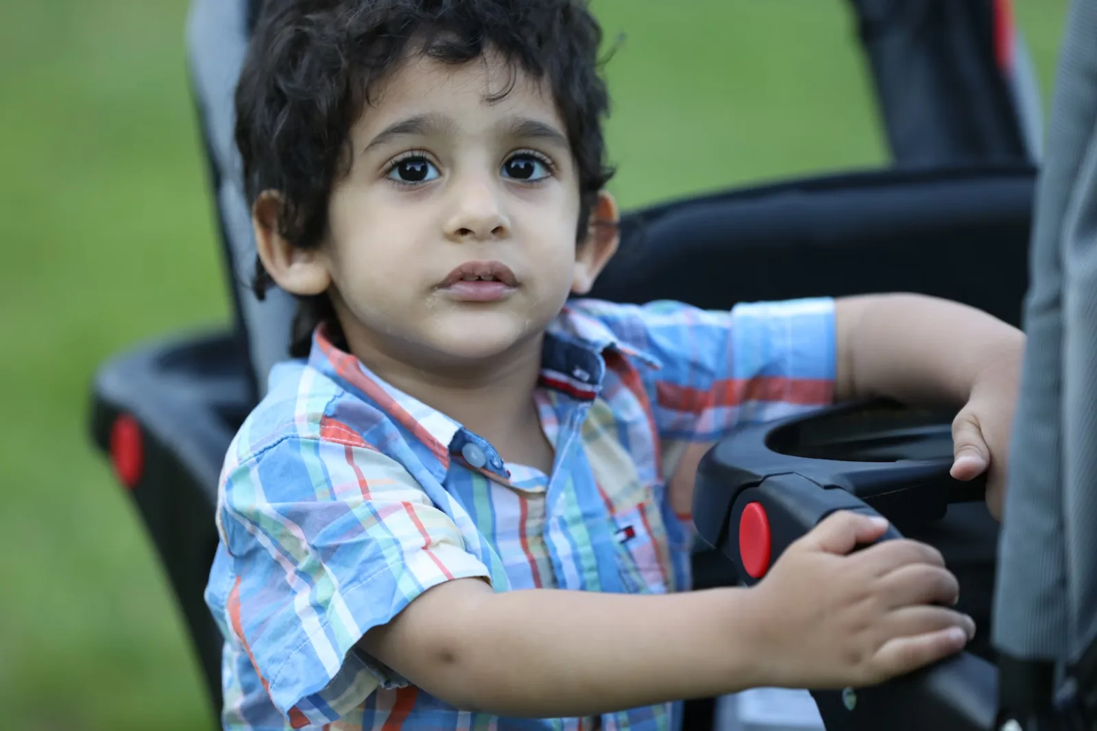 Toddler sitting in a child car seat
