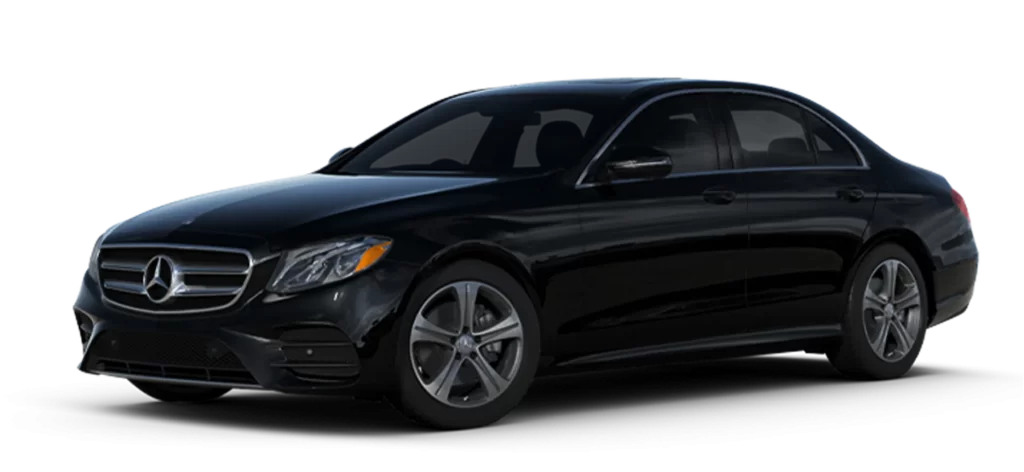 Black Mercedes-Benz sedan on a black background