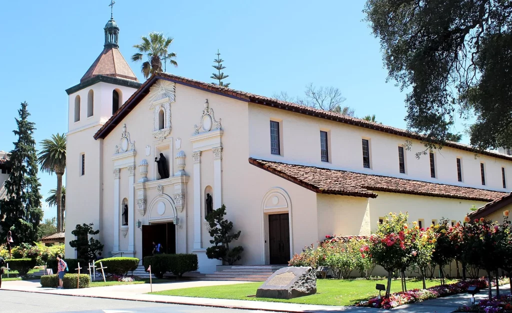 Mission Santa Clara de Asis church with white facade and bell tower