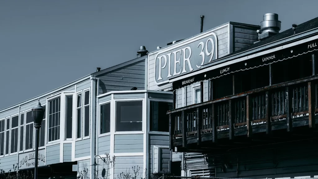Pier 39 sign and wooden buildings on the San Francisco waterfront