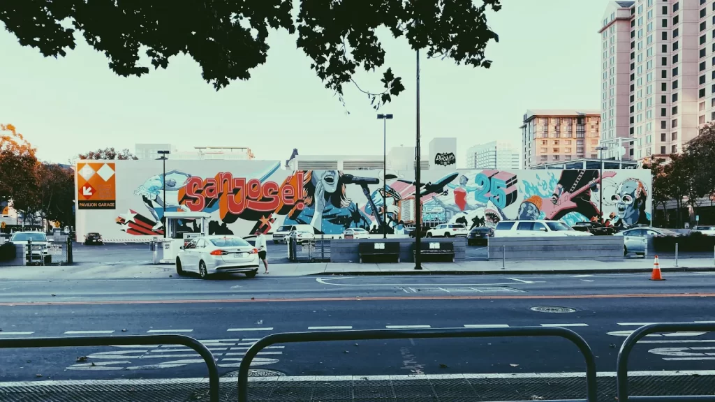 The words “San Jose” graffitied on a wall.