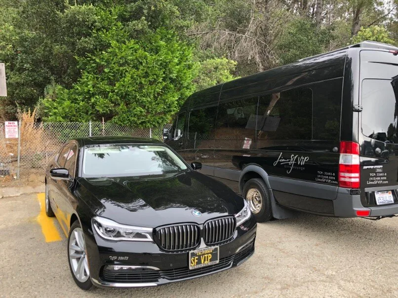 A BMW 750i in a parking area